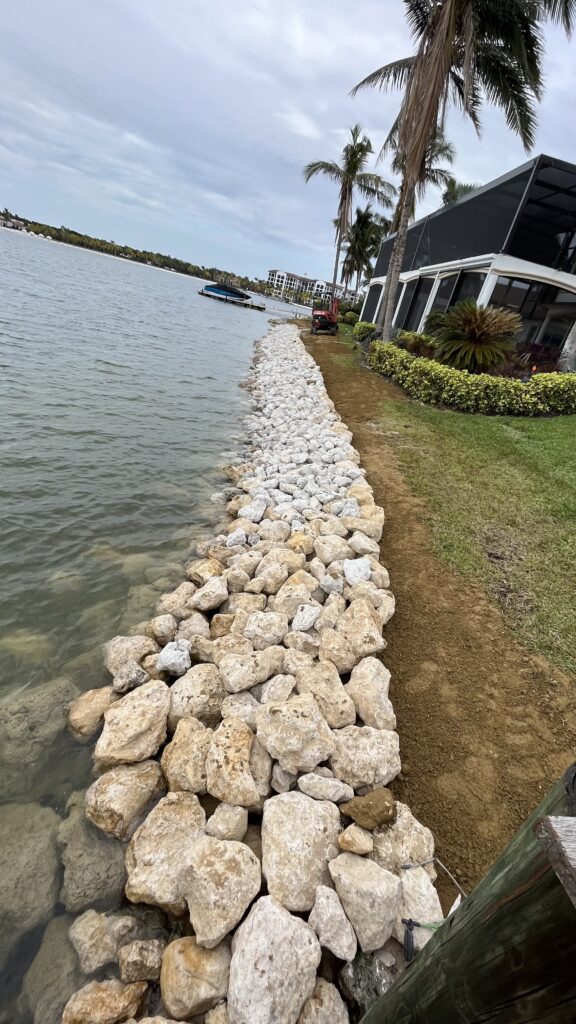 Rock Installation by Lake Scape